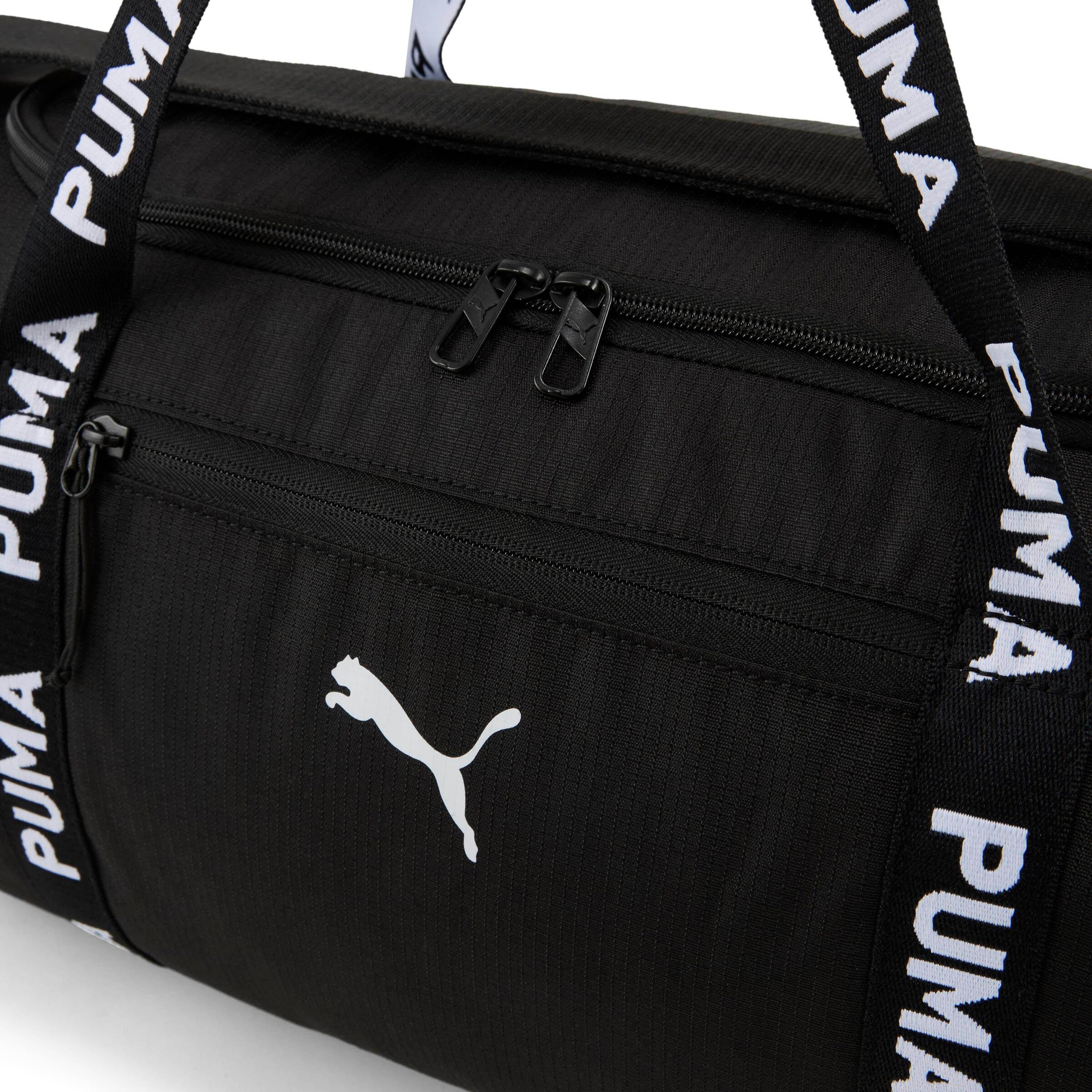 PUMA Sporttasche 'Ess Barrel' in Schwarz