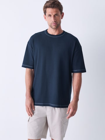 Next - Camisa em azul: frente