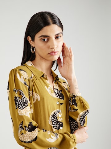 King Louie - Vestidos camiseiros 'Carina' em amarelo