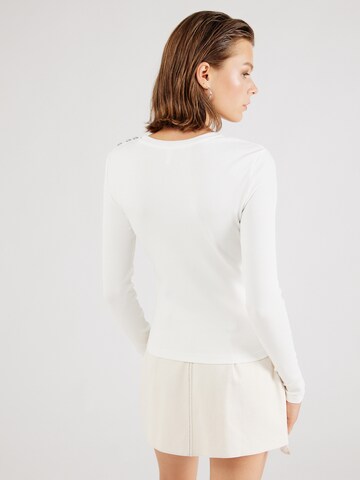 ONLY - Camiseta 'ONLCHECKIE' en blanco
