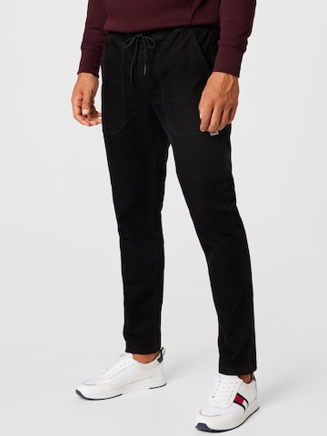 melns Tommy Jeans Standarta Bikses 'Scanton': no priekšpuses
