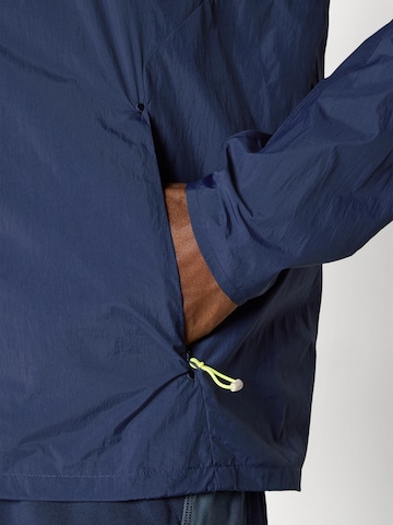 ASICS Sportjacke 'ROAD PACKABLE' in Blau