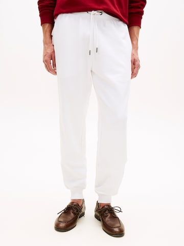 TOMMY HILFIGER Tapered Trousers in White: front
