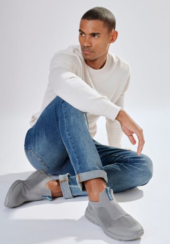 Scarpa slip-on di JOHN DEVIN in grigio