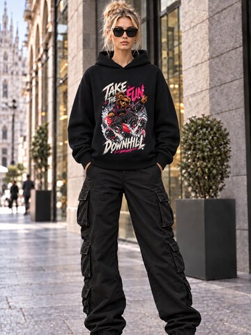 LUNØIR StudioSweater majica 'BOSS Femme Winter Downhill Tubing' - crna boja