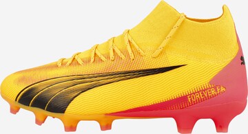 Chaussure de foot 'Ultra Pro' PUMA en jaune : devant