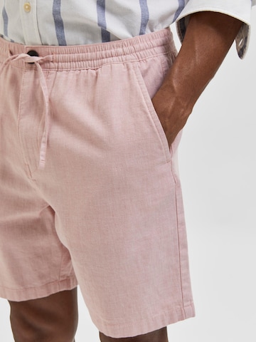 regular Pantaloni 'Newton' di SELECTED HOMME in rosa