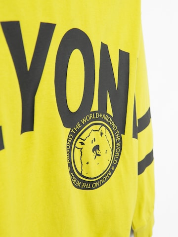 Cool Club - Sweatshirt em amarelo