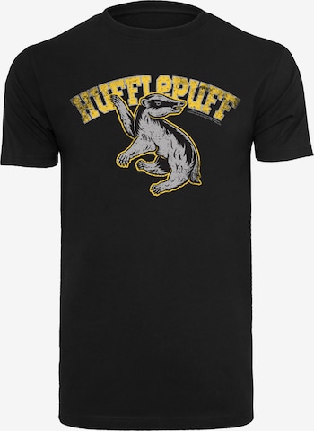 Maglietta 'Harry Potter Hufflepuff Sport Emblem' di F4NT4STIC in nero: frontale