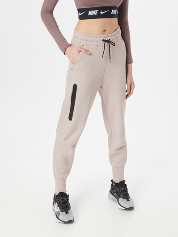 Nike Sportswear Ozke Hlače 'Tech Fleece' | siva barva: sprednja stran