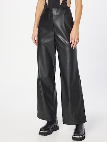 Wide leg Pantaloni di Warehouse in nero: frontale