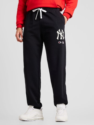 Champion Authentic Athletic Apparel Tapered Trousers in Black: front