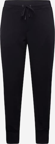 On Tapered Trousers in Black: front