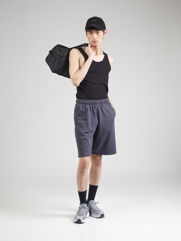Champion Authentic Athletic Apparel - Loosefit Pantalón en lila