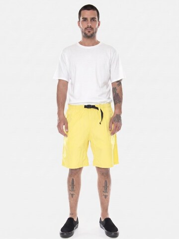 Baggy Pantaloni 'M' Clover Short Limoncello Stone Washed' di Carhartt WIP in giallo