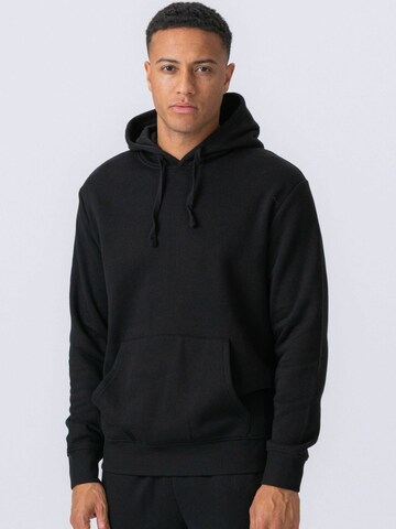 Pull-over ' Essential Hoodie ' TEESHOPPEN en noir : devant