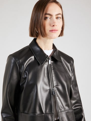 Calvin Klein Демисезонная куртка в Черный