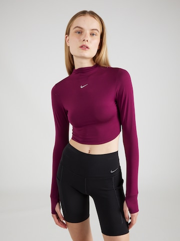 NIKE Performance shirt 'One Luxe Ess' in Red: front