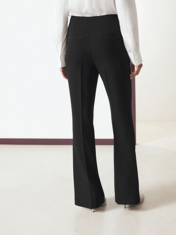 Next - Bootcut Pantalón en negro