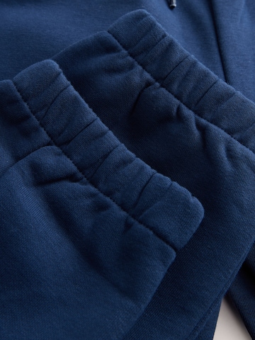 Next Tapered Byxa i blå