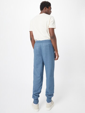 Tapered Pantaloni 'Sometimes We Just Know' di Fli Papigu in blu