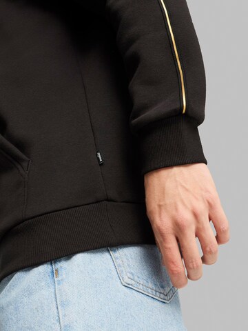 PUMA Sportsweatshirt 'Ess' in Schwarz