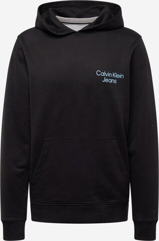 Sweat-shirt Calvin Klein Jeans en noir : devant