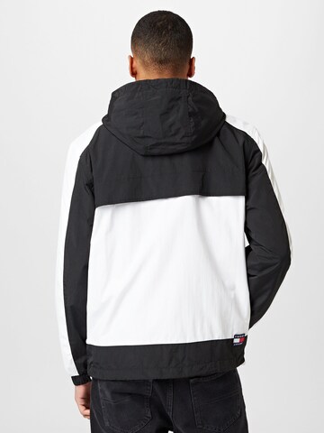 Tommy Jeans Between-season jacket 'Chicago' in Black