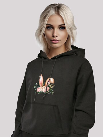 Sweat-shirt 'Blumen Osterhasen Ohren Dekor' F4NT4STIC en noir