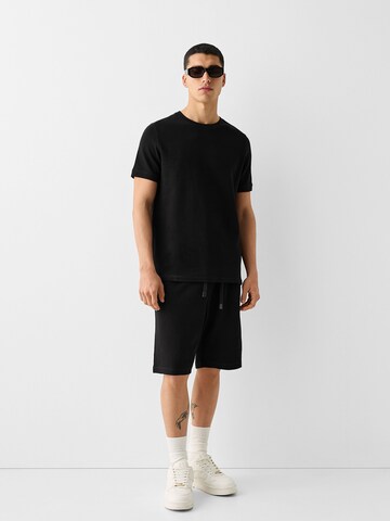 Bershka Loosefit Bukser i sort