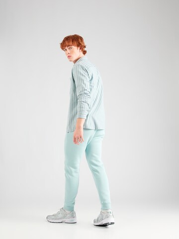 HOLLISTER Tapered Broek in Blauw