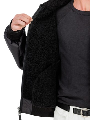ALPHA INDUSTRIES Winter Jacket 'B-15 Modified' in Black