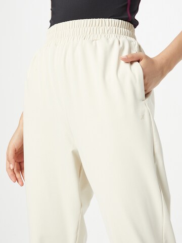 HKMX Tapered Παντελόνι φόρμας 'Flow' σε μπεζ