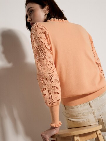 Pull-over Apricot en orange