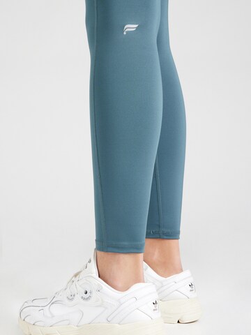 Fabletics Skinny Sportbyxa 'ANYWHERE MOTION' i grön