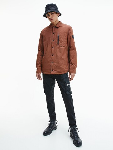 Calvin Klein Jeans Prehodna jakna | rjava barva
