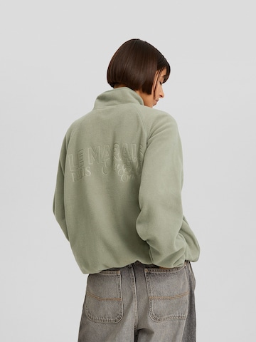 Pull-over Bershka en vert : devant