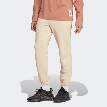 ADIDAS SPORTSWEAR Tapered Workout Pants in Beige: front