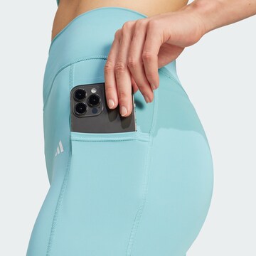 ADIDAS PERFORMANCE Skinny Sportbroek 'Optime' in Blauw