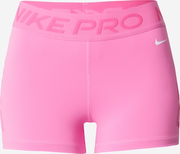 Skinny Pantalon de sport NIKE en rose : devant