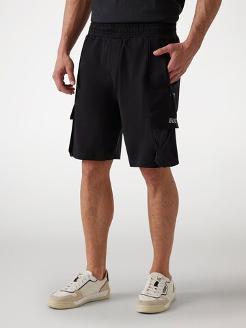 GUESS Regular Pants in Black: front