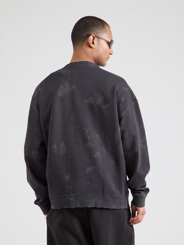 HUGO Sweatshirt 'Nustroyos' in Schwarz