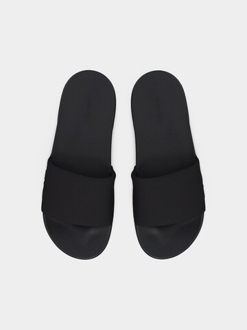 Calvin Klein Pantoletter 'ESS' i sort