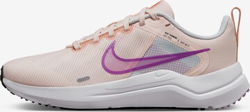 NIKE Loopschoen 'Downshifter 12' in Roze: voorkant