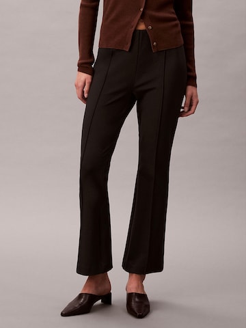 Calvin Klein Flared Trousers in Brown: front