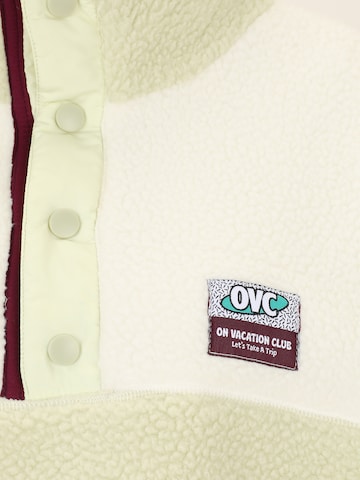 On Vacation Club Pullover 'Wanderlust' i grøn