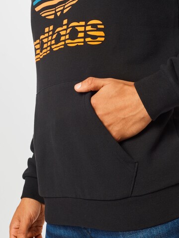 ADIDAS ORIGINALS Sweatshirt in Schwarz