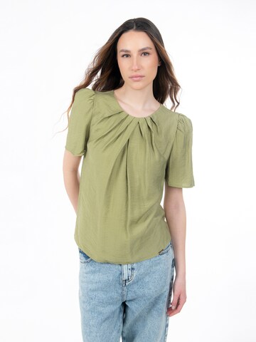 Influencer Blus i grön: framsida