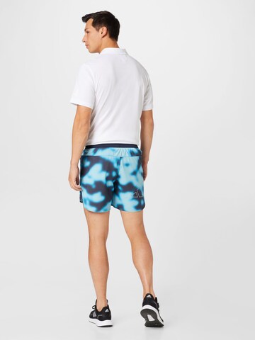 ADIDAS SPORTSWEAR Normální Sportovní kalhoty 'Run Icons Logo Graphic Aop' – modrá