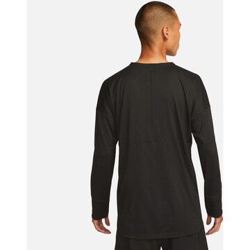 NIKE Funktionsshirt in Schwarz